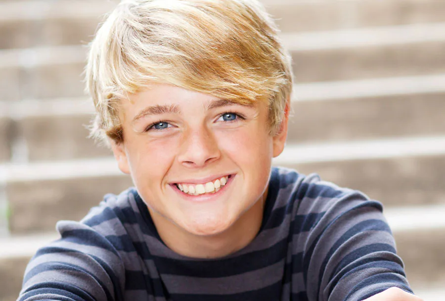 Teen boy smiling | Teen Orthodontics