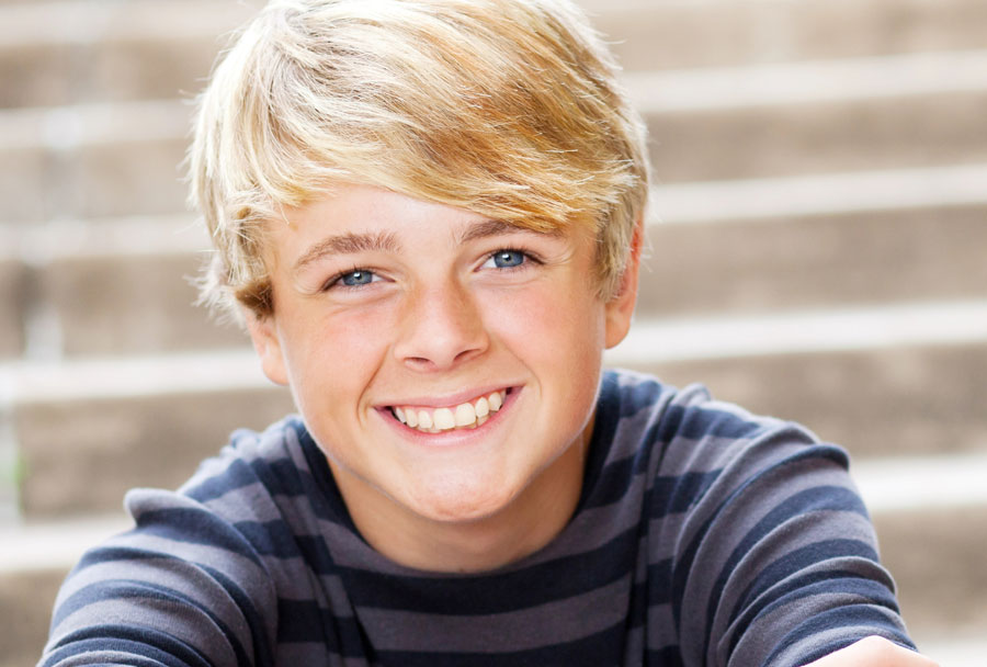 Teen boy smiling | Teen Orthodontics